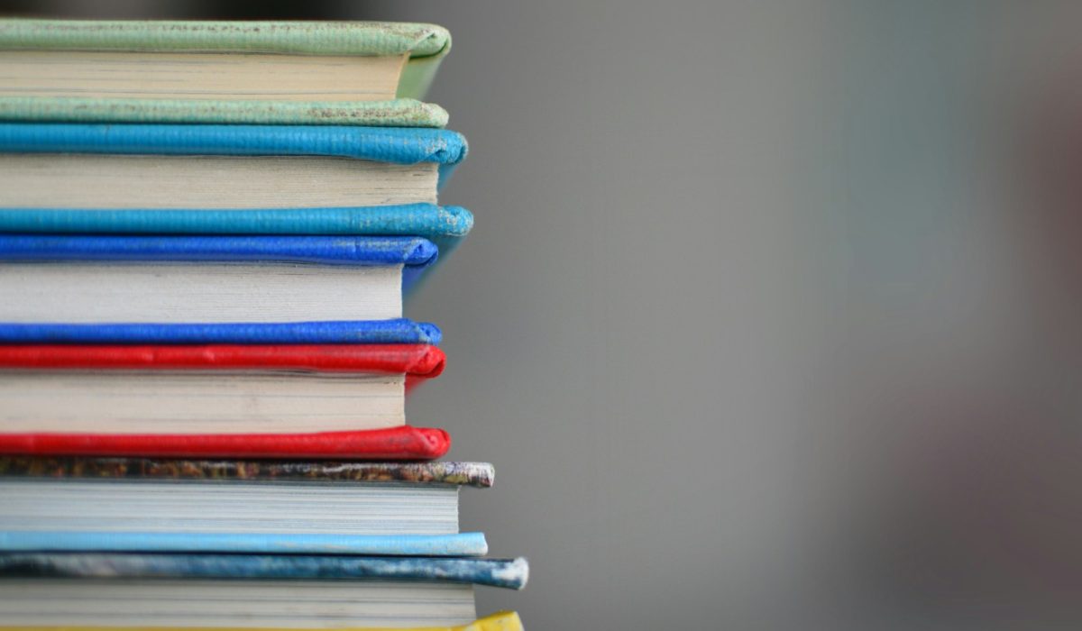 shallow focus photography of books